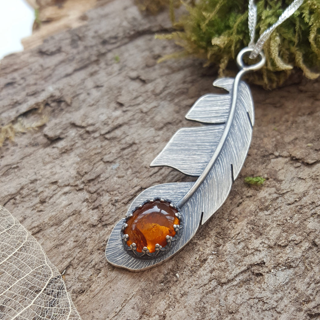 Sterling silver feather pendant with a stunning Amber gemstone - Anna Ancell Jewellery