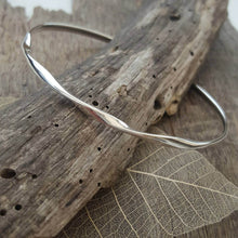 Sterling silver bangle with a loose twist - Anna Ancell Jewellery
