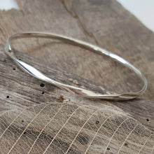 Sterling silver bangle with a loose twist - Anna Ancell Jewellery
