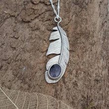Sterling silver feather pendant with a 10mm x 8mm blue goldstone gemstone - Anna Ancell Jewellery