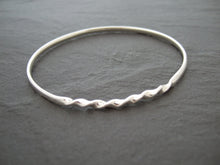 Sterling silver bangle with a tight twist - Anna Ancell Jewellery